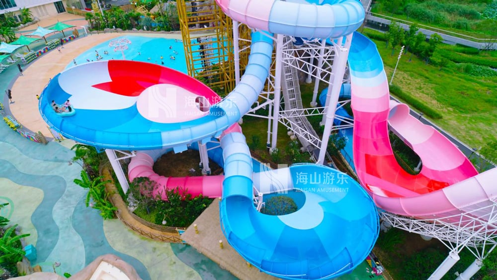 双重风暴，极致竞速——星际盘旋+巨浪翻滚组合引爆水乐园刺激体验